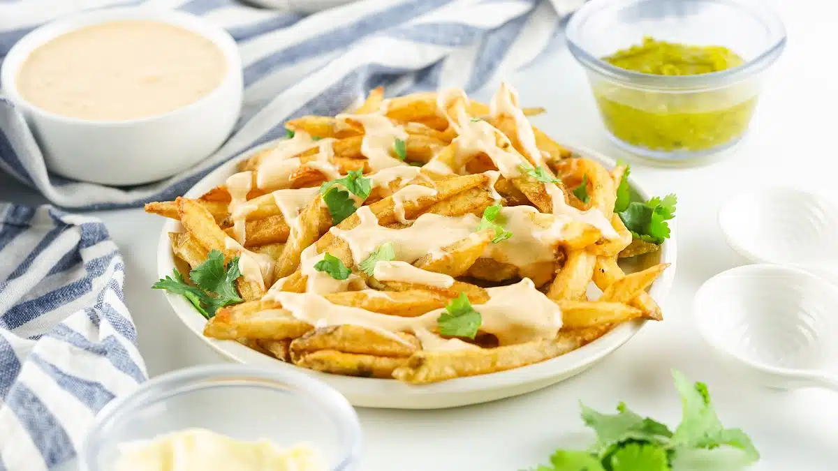 french fries with animal sauce drizzled on top