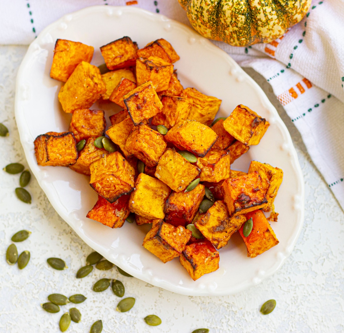 overhead of cooked squash on a platter