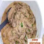 beef stroganoff in a dutch oven with text overlay
