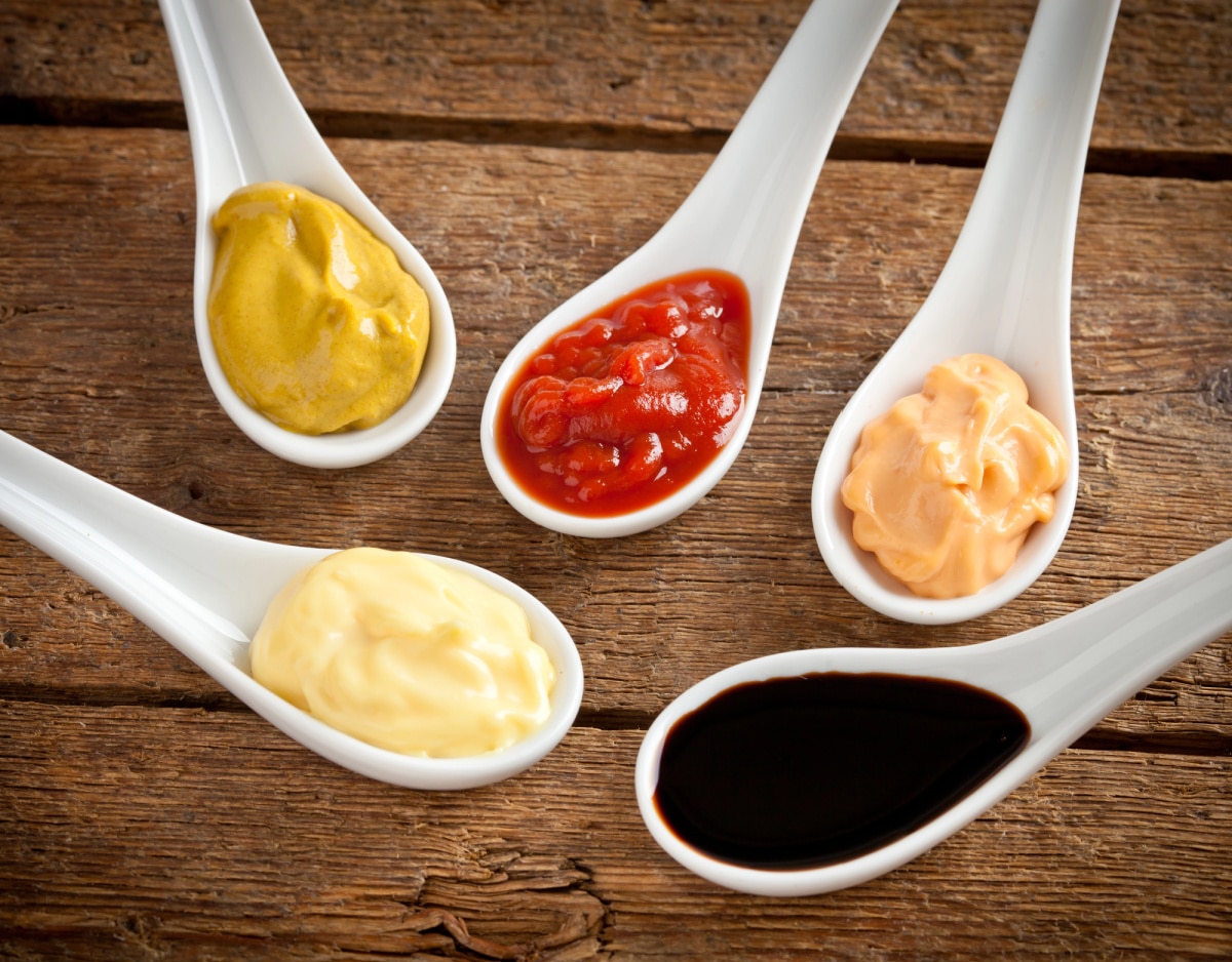 five sauces on spoons
