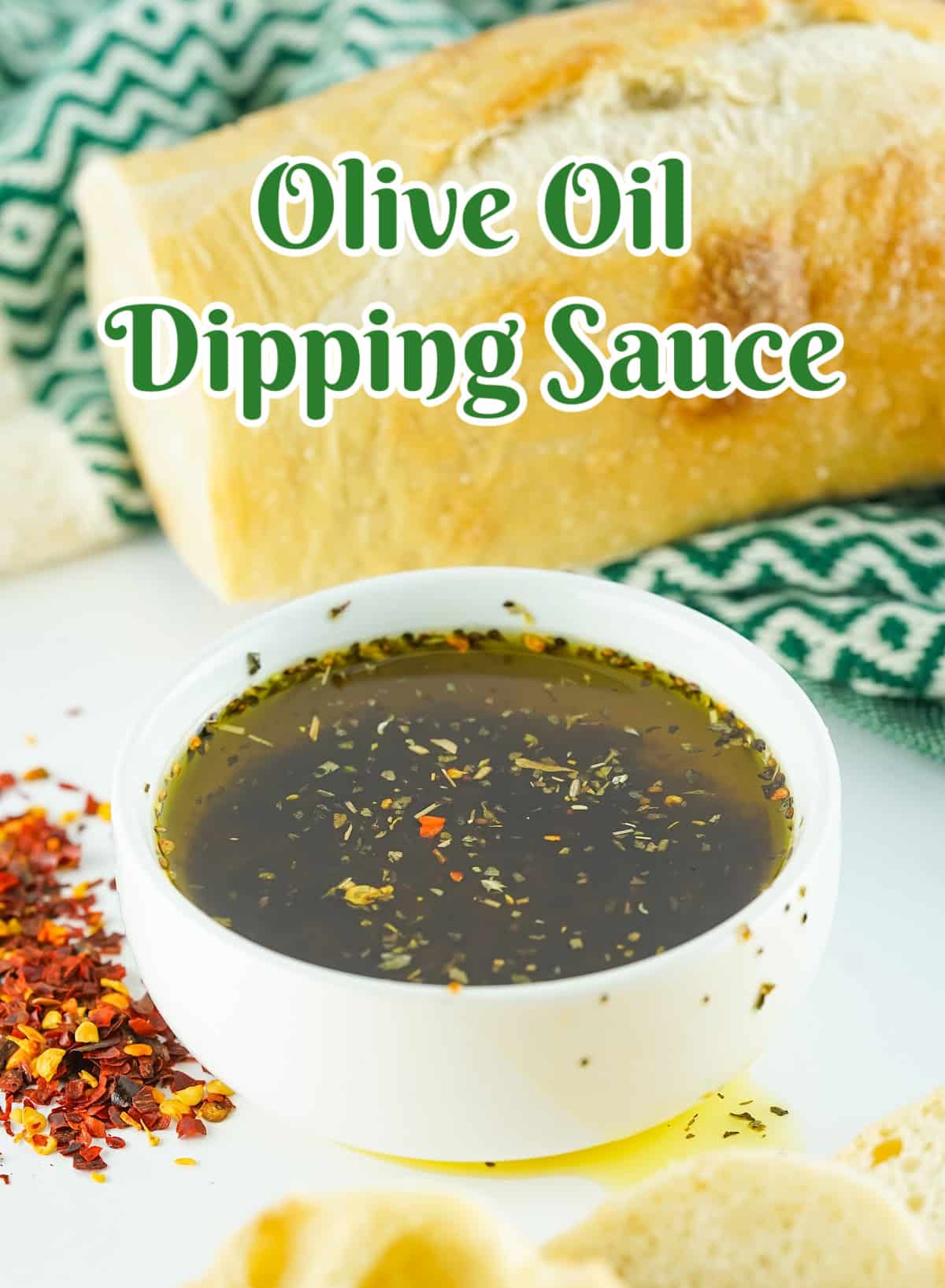 bowl of oliv oil dipping sauce with a baguette