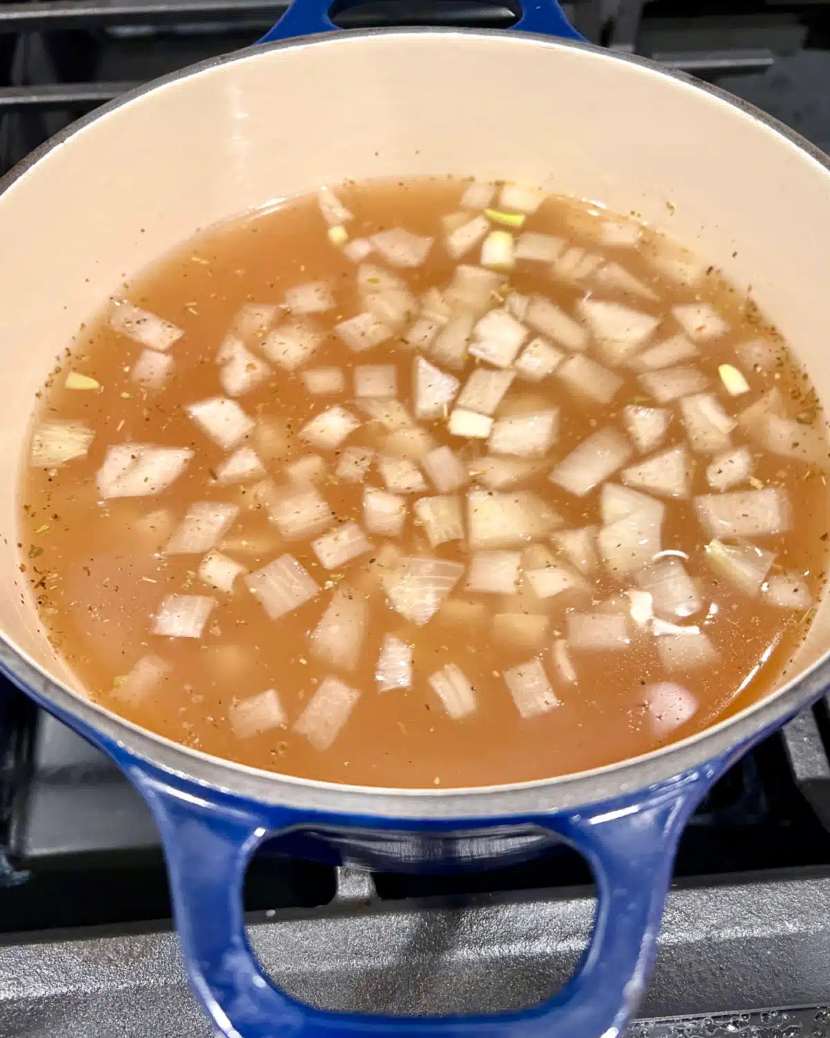 making broth mixture on the stovetop