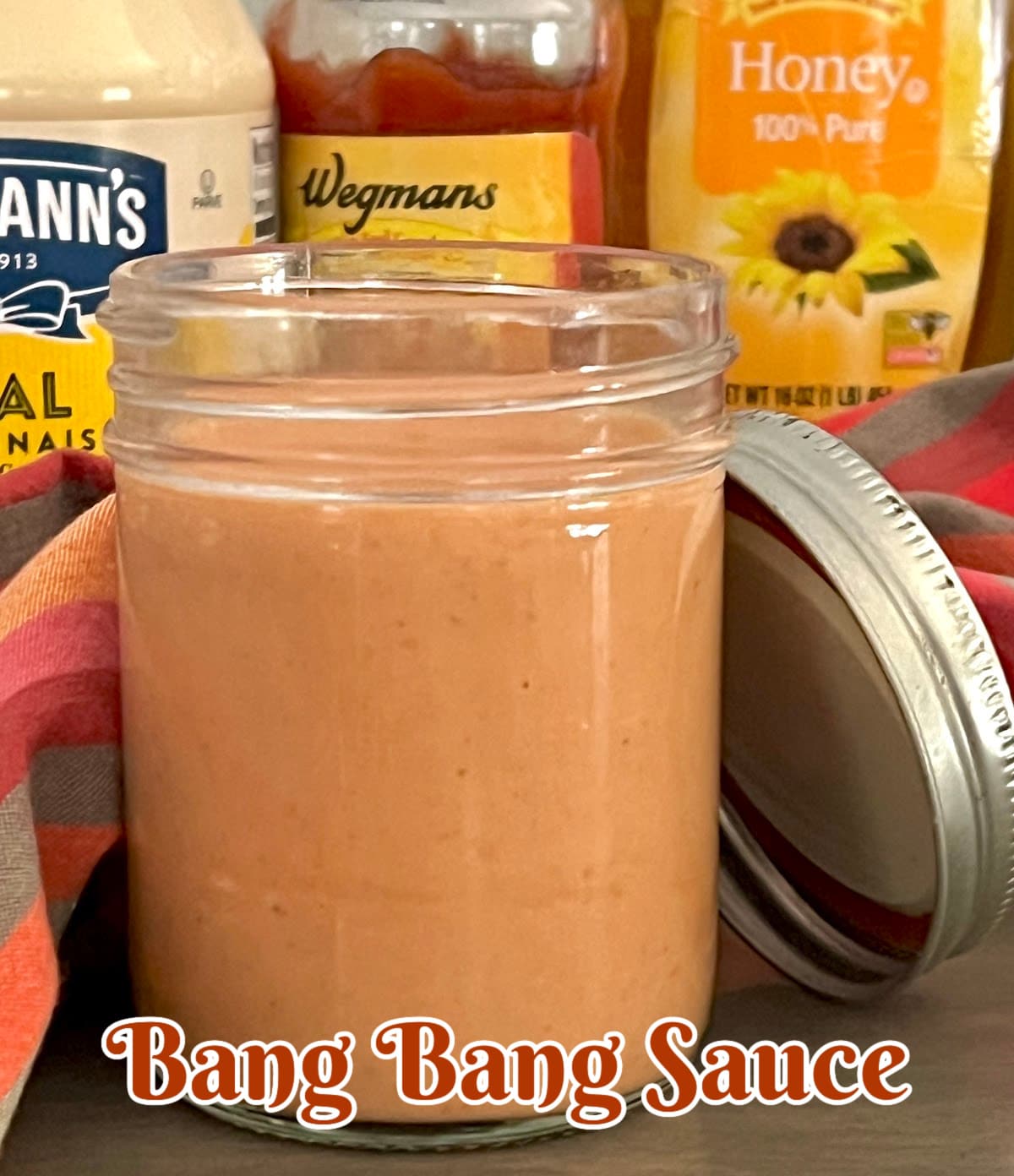 jar of homemade bang bang sauce with label