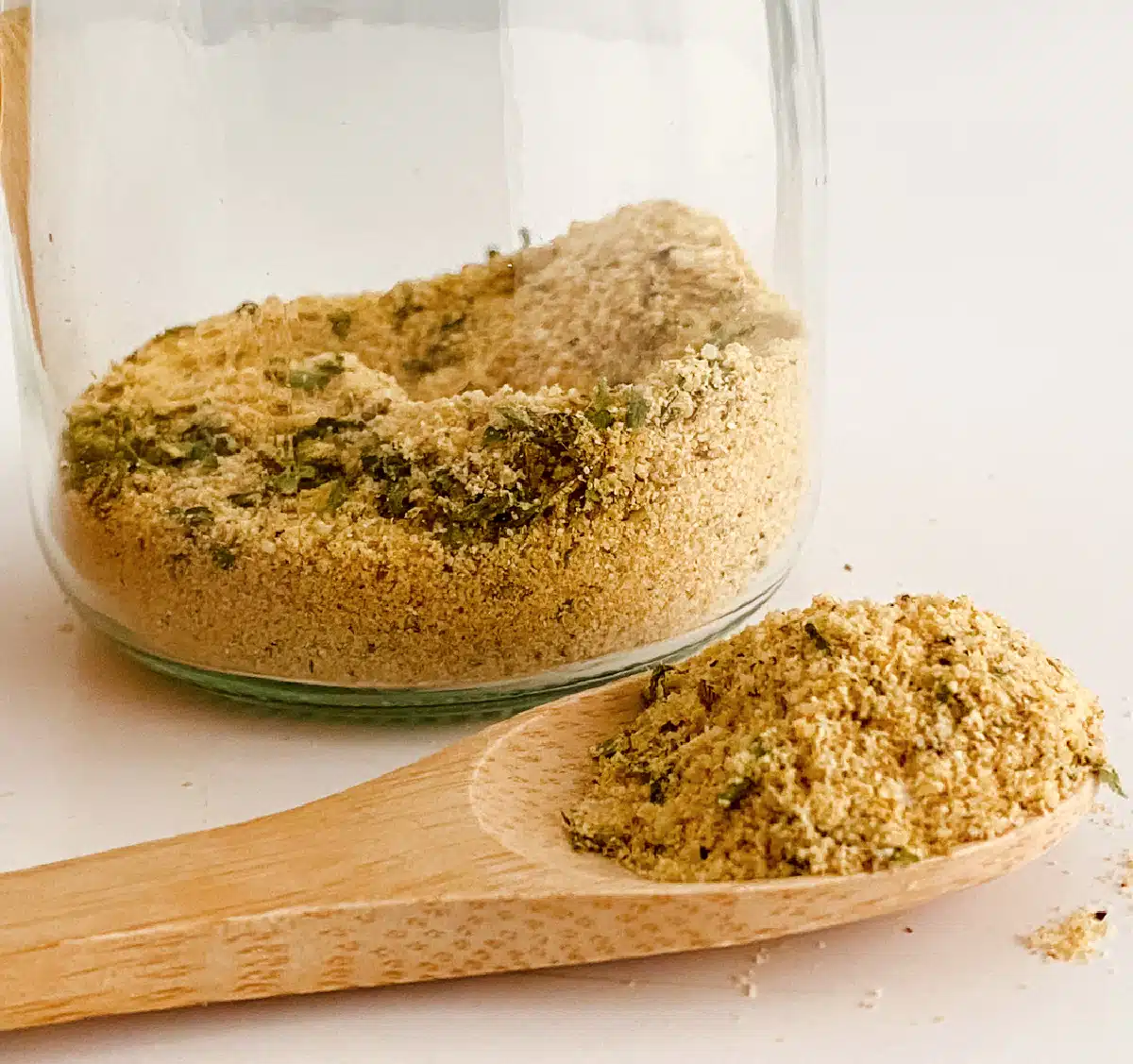 ramen blend on a wooden spoon with a jar in the background