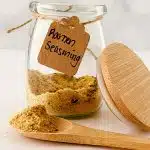 Ramen Seasoning in a jar and on a wooden spoon