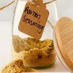 ramen seasoning in a jar with a label and text overlay