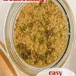 overhead of ramen seasoning in a glass jar with txt overlay