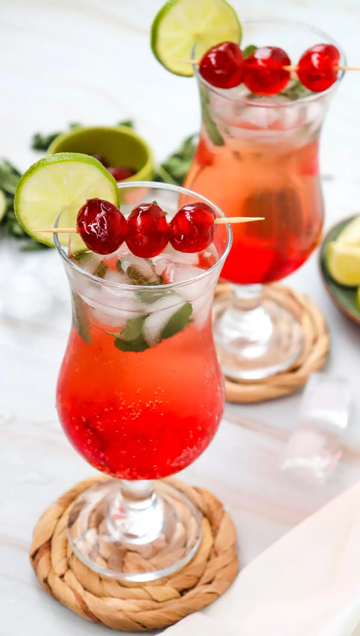 Shirley Temple mocktails with marachino cherries on skewers