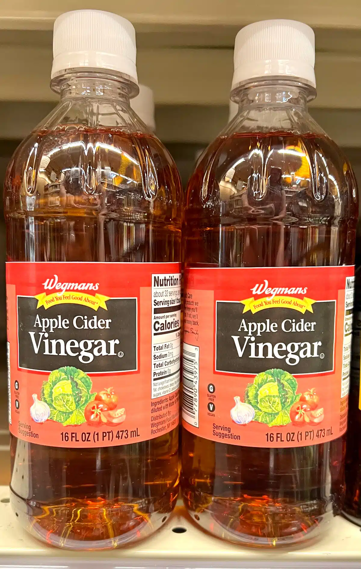 two bottles of apple cider vinegar