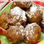 apple fritter bites with powdered sugar and text overlay