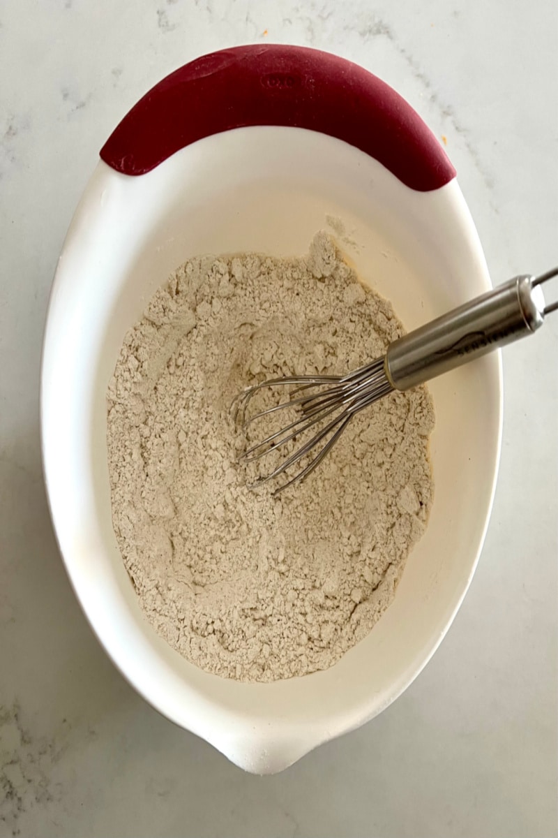 combining dry ingredients for applesauce fritters