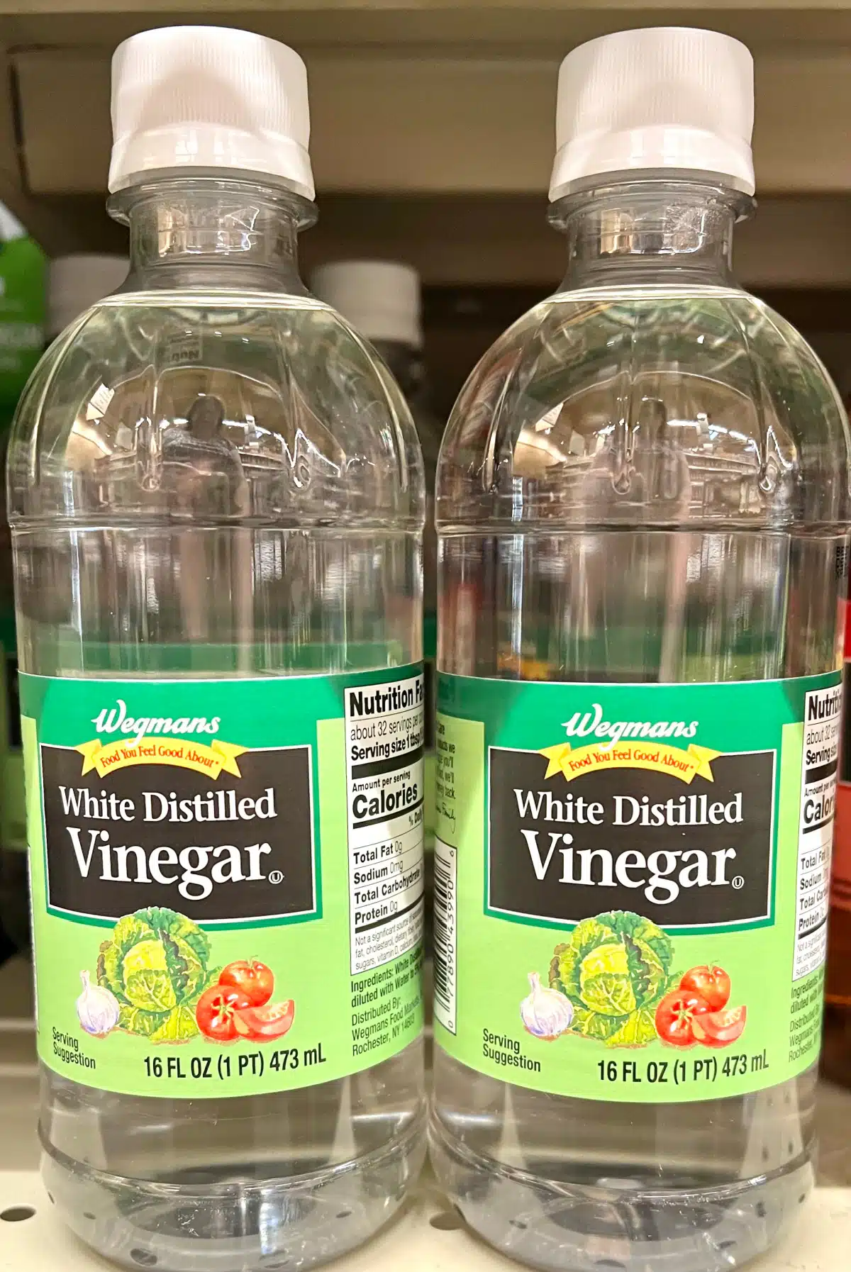 two bottles of white vinegar