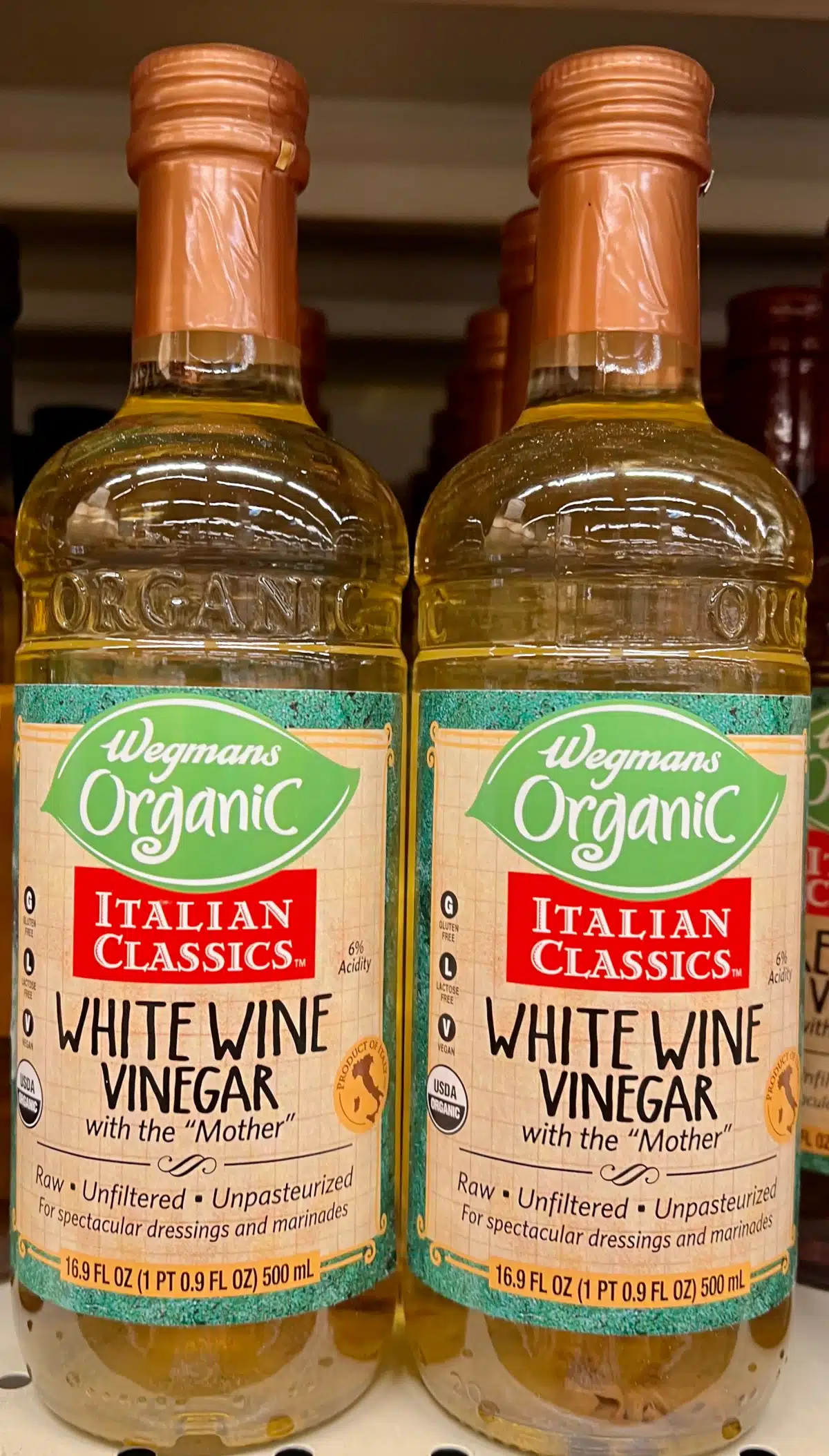 two bottles of white wine vinegar