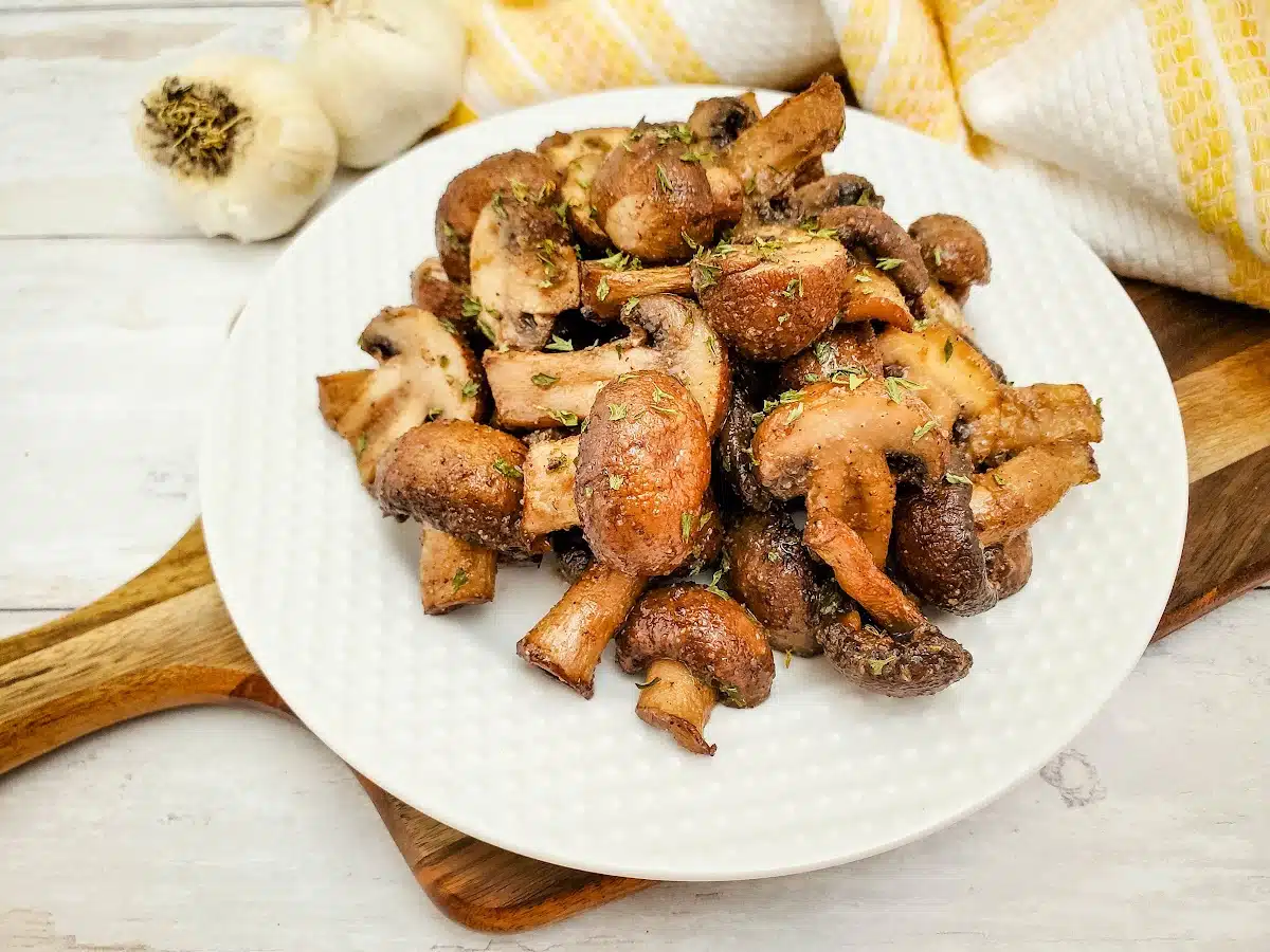 air fried balsamic mushrooms on a white plate