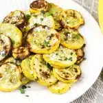 air fryer summer squash on a white dish