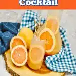 simple paloma cocktail in a glass with fruit slices and text overlay