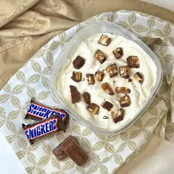 overhead of snickers ice cream in freezer-safe container