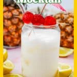no-alcohol pina colada in a glass with cherry garnish and text overlay