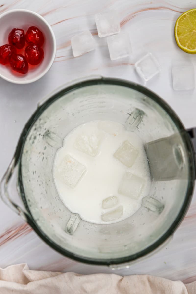 adding ice cubes in blender