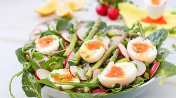 spinach salad with arugula and soft boiled eggs
