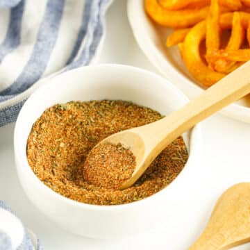 french fry seasoning in a bowl with spoon