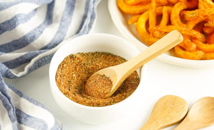 french fry seasoning in a bowl with spoon