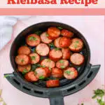 air fried kielbasa slices in an air fryer basket with text overlay