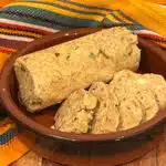 cowboy butter in a dish with a napkin