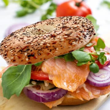 everything bagel with lox, red onion, tomato and watercress