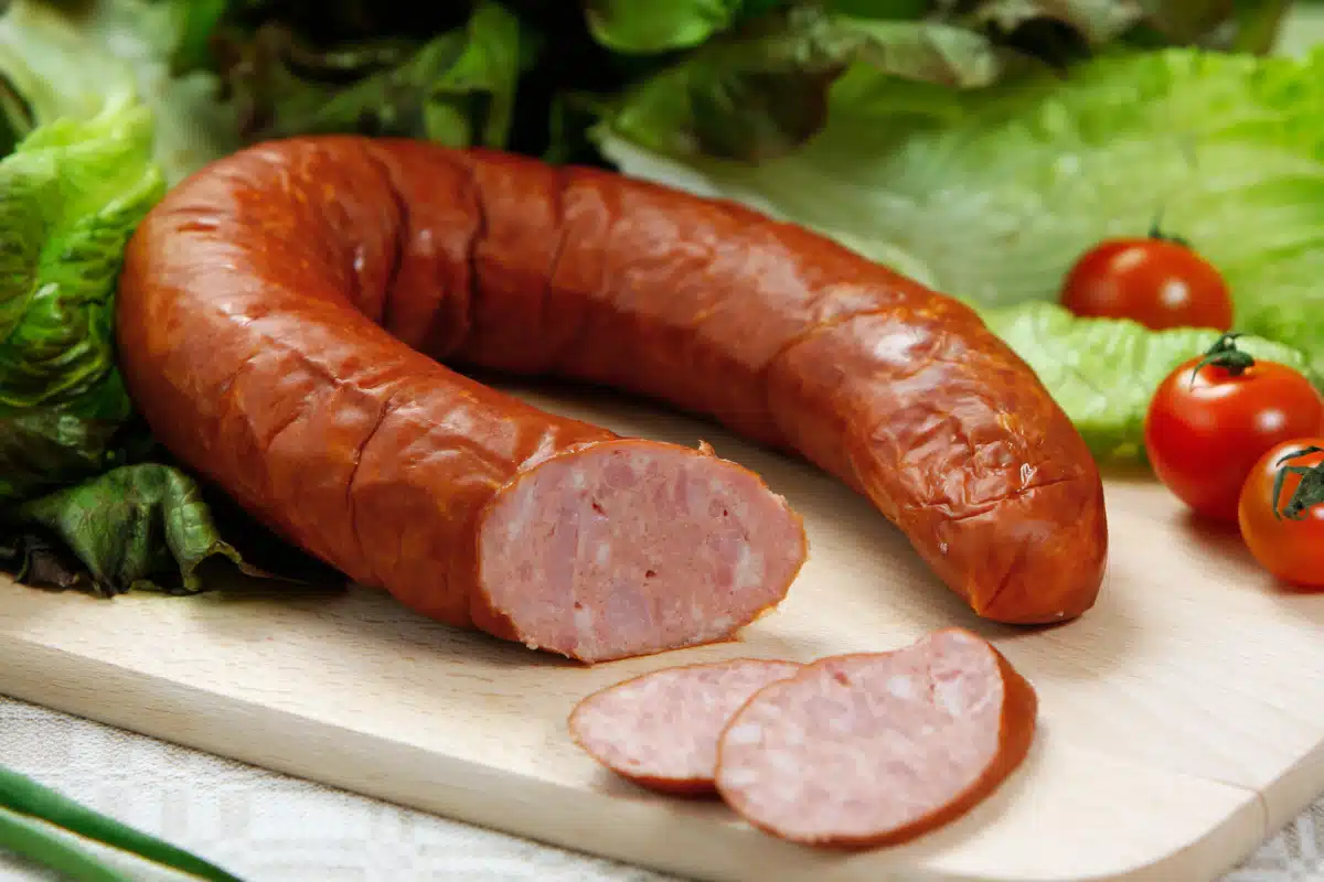u-shaped kielbasa on a wooden board