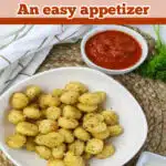 air fried gnocchi pasta in a white bowl with dipping sauce and text overlay