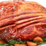 sliced spiral ham on a bed of greens