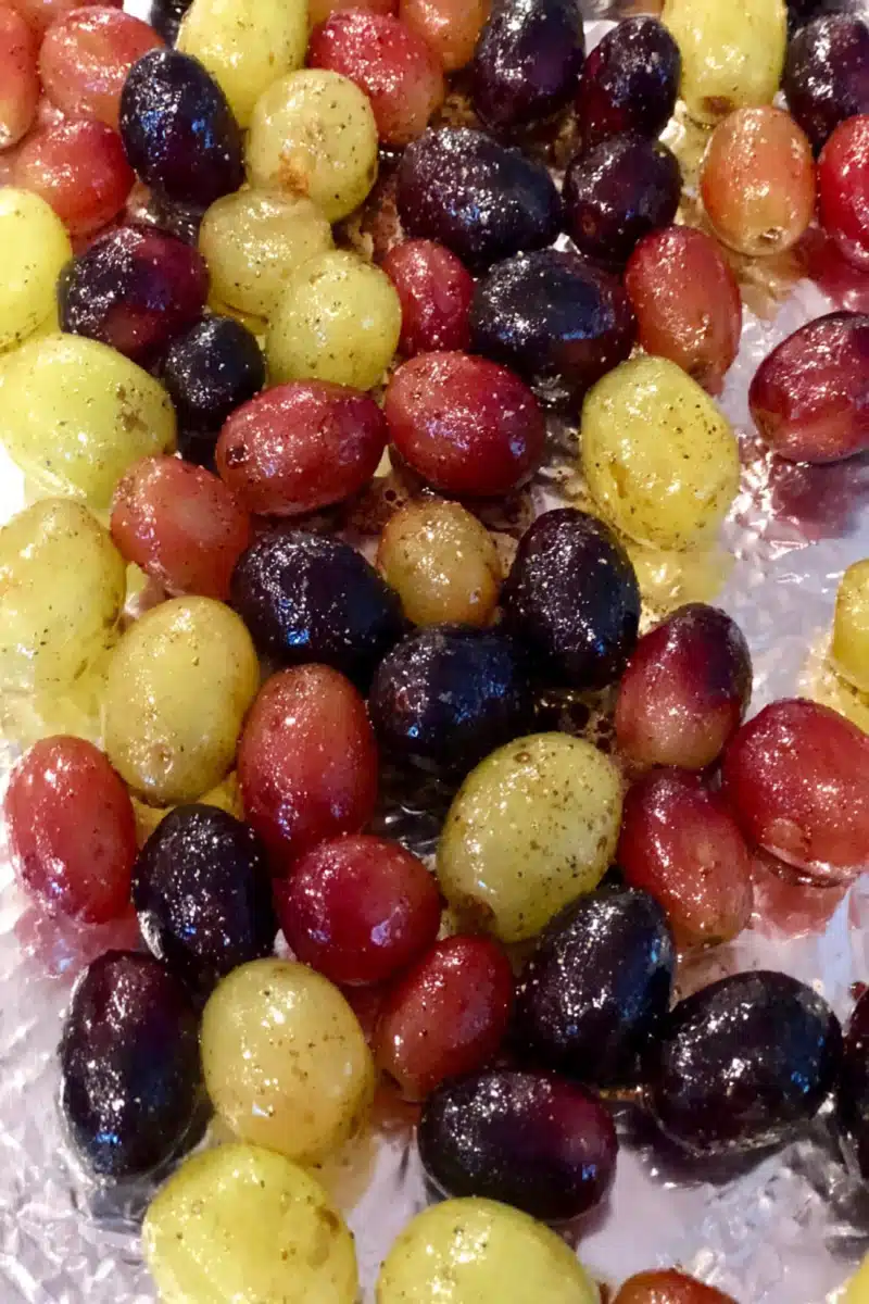 roasted grapes on a baking sheet