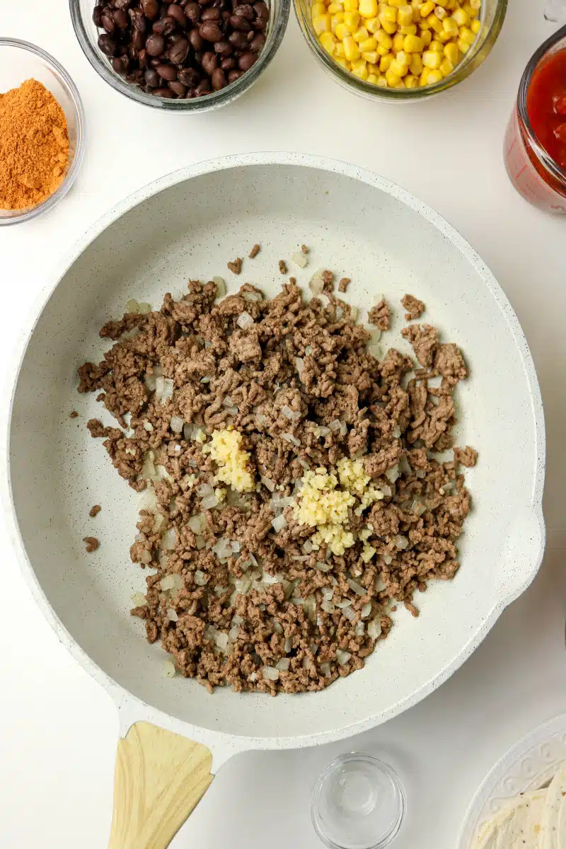 cooking ground beef mixture in a skillet