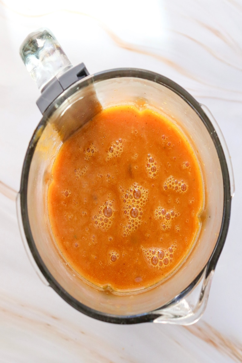 pureeing soup in a blender