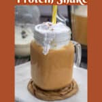 pumpkin protein shake with cold foam n a glass mason jar with handle and text overlay