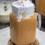 close up of pumpkin pie protein smoothie with cold foam topping