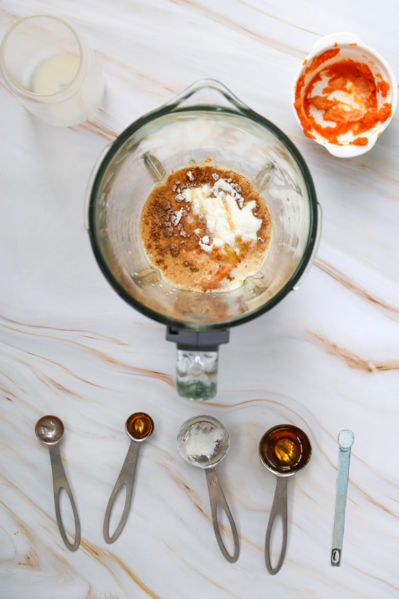 combining protein shake ingredients in the blender