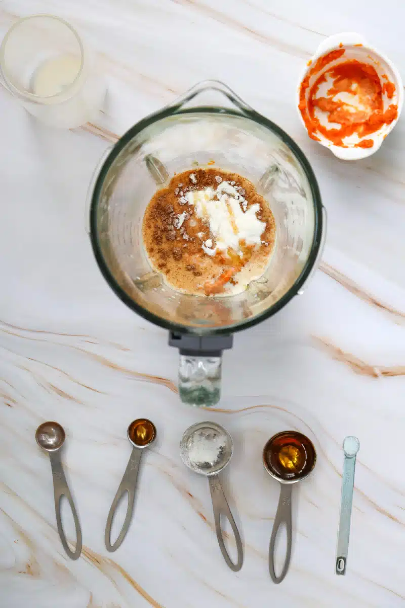 combining protein shake ingredients in the blender