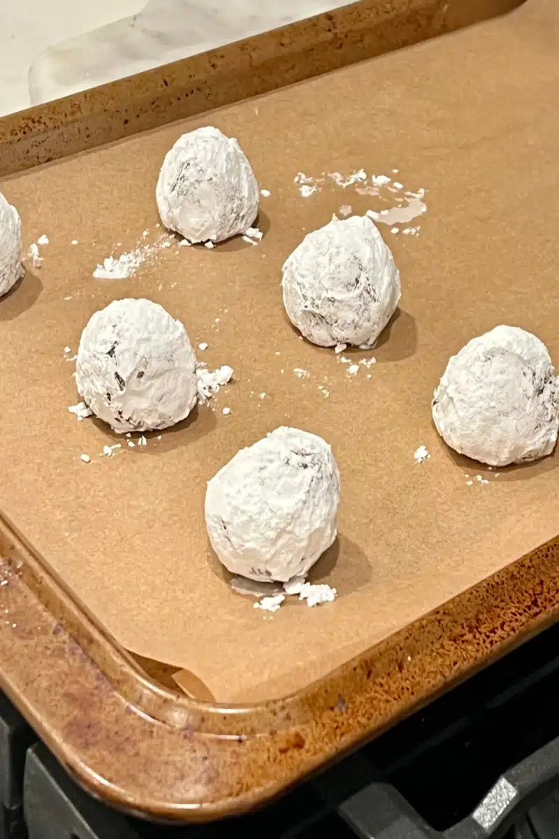 cookie dough rolled in confectioners sugar