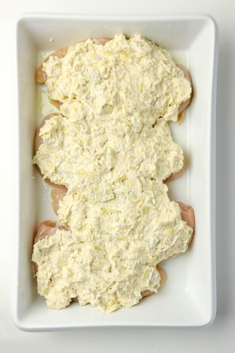 chicken breasts covered with mayonnaise topping