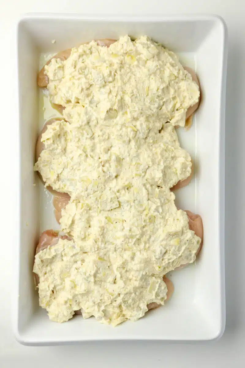 chicken breasts covered with mayonnaise topping