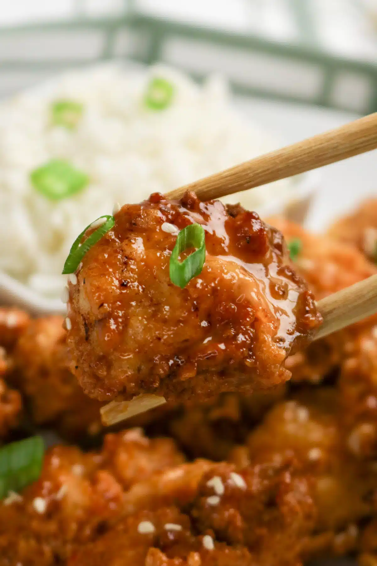 picking up bang bang chicken with chopsticks