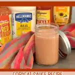 mason jar of bang bang sauce with ingredients in background and text overlay