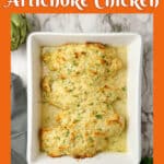 overhead of baked creamy chicken and artichokes in a baking dish with text overlay