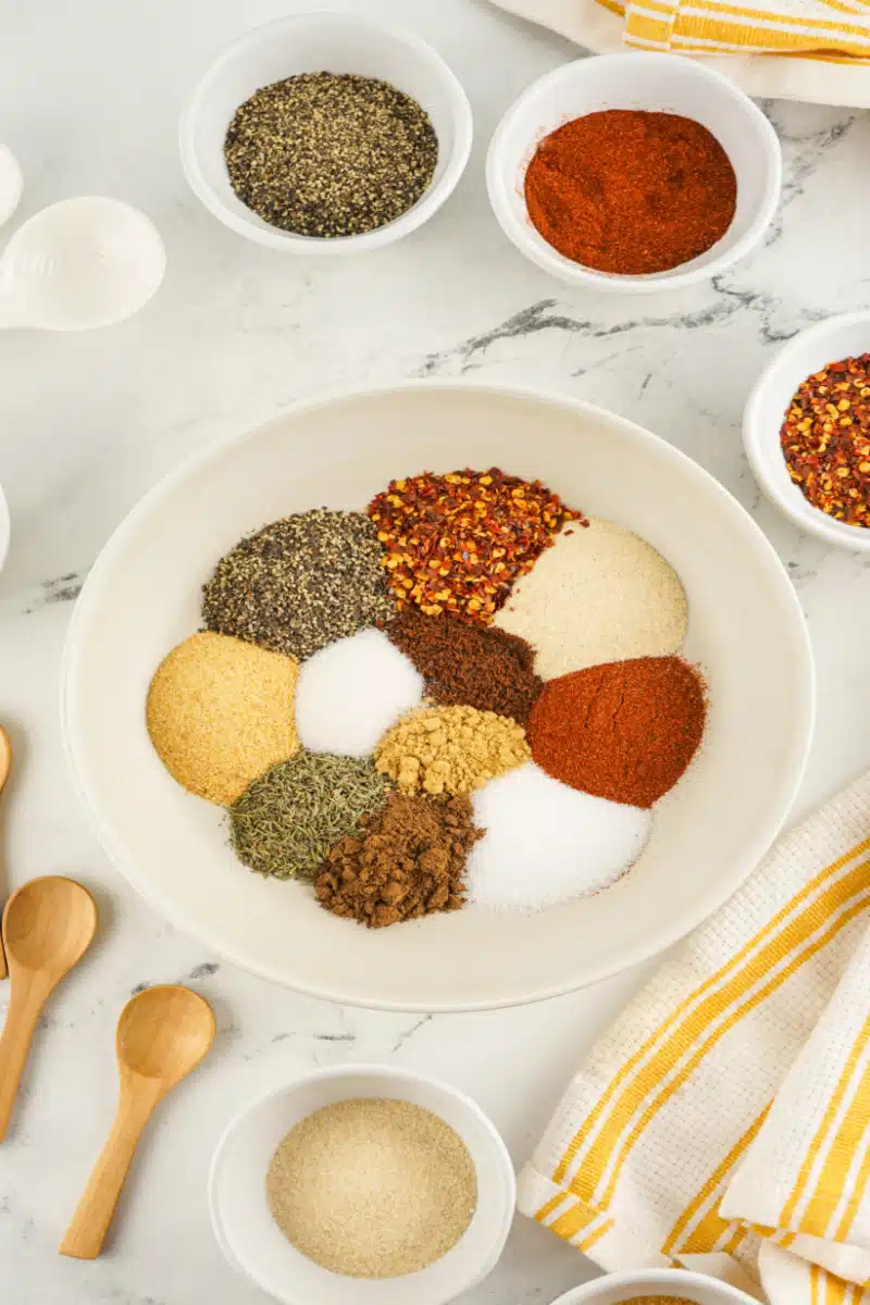 combining spices in a mixing bowl