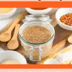 overhead of jar filled with jerk jamaica seasoning with text overlay