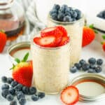 two jars of overnight oats with fresh berries