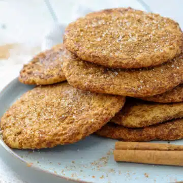 brown sugar sugar cookies piled on a plate