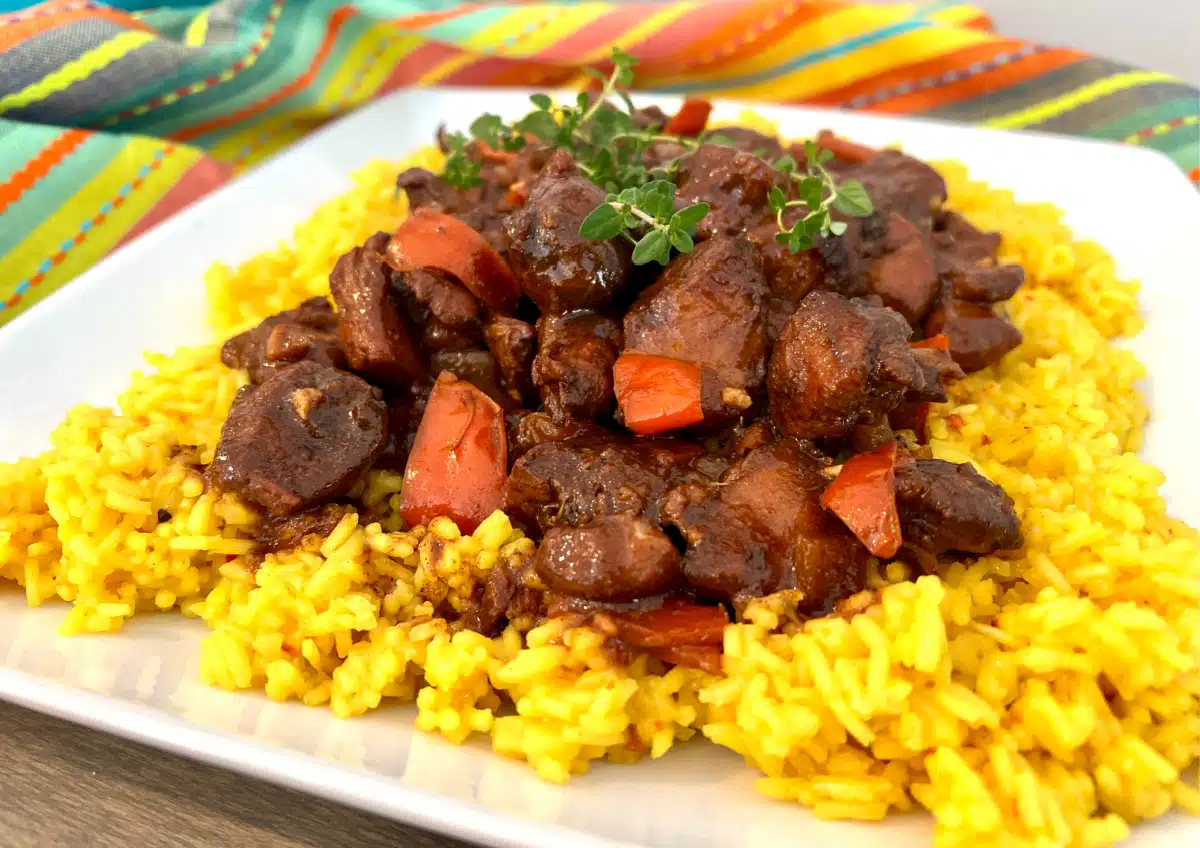 Browned Chicken Stew on yellow rice